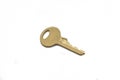 A brass padlock key isolated on a white background Royalty Free Stock Photo