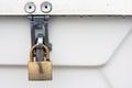 Brass padlock on storage container Royalty Free Stock Photo