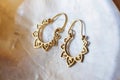 Brass pair of earrings in oriental style