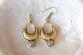 Brass pair of earrings in oriental style