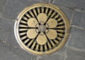 Brass Plate for access to underground electrical lines in Portofino, Italy.