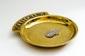 Brass Pocket Change tray with a pair of overlapping angled nickels