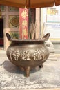 Brass Pot as an incense holder in front of the entrance of the Chinese Temple