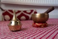 A brass resin burner and a singing bowl