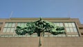 Brass sculpture on the old postal building in Ostend