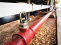 Brass springer nozzle on pipe under belt conveyor for fire fighting system