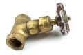 Brass stop water valve on white background. Top view. Royalty Free Stock Photo