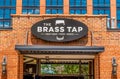 The Brass Tap Exterior Facade Brand and Logo Signage Advertising Royalty Free Stock Photo