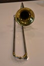 Brass trombone on a white background