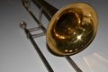 Brass trombone on a white background