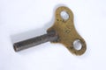 Brass wind-up key Royalty Free Stock Photo