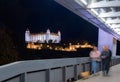 Bratislava Castle at Night Framed by Modern Bridge Royalty Free Stock Photo