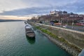 Bratislava castle over river Danube with docked ship Royalty Free Stock Photo