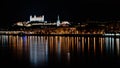 Bratislava dark night skyline with reflections in Danube river