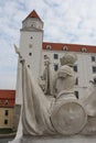 Bratislava, Slovakia - April, 2011: cloudy sky, knight statue and tower of Bratislava Castle.