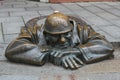 Bratislava, Slovakia - 19 April 2012: Famous statue of Cumil, a sewer worker coming out of a manhole