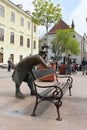 Bratislava, Slovakia - April, 2011: soldier statue near bench on Hlavne square. Royalty Free Stock Photo