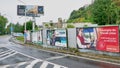 Easter European street with distinctive bill board advertisements