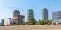 BRATISLAVA, SLOVAKIA - AUGUST 30 2019: Building crane and buildings under construction, skyscrapers buildings in Bratislava over