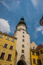 Bratislava, Slovakia: City street daily view of the historical buildings and the famous St. Michael`s Gate and Tower in the