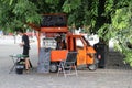 Orange vehicle coffee seller in Bratislava town