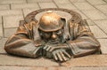 BRATISLAVA, SLOVAKIA - July 11th, 2014: Cumil the Sewer Worker, the most famous statue in Bratislava