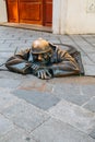 Cumil man at work statue at old town in Bratislava, Slovakia Royalty Free Stock Photo