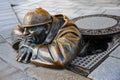 Bratislava, Slovakia - March 2016: Famous bronze sculpture of `Cumil, The Watcher`, by by Viktor Hulik Royalty Free Stock Photo