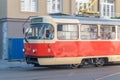 Retro red and white tram on the street of Bratislava