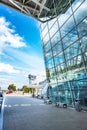 BRATISLAVA, SLOVAKIA Ã¢â¬â OCTOBER 6 2019: Sidewalk in front of Arrivals hall of Bratislava airport terminal with air traffic