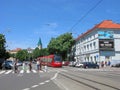 Bratislava, Slovakia, red tram, people on pedestrian crossing