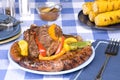 Bratwurst and steak picnic dinner Royalty Free Stock Photo