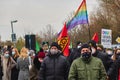 Demonstrators wearing face masks protest against the meeting of the AFD party