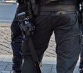 Belt of a German policeman in black uniform with a camcorder to preserve evidence by video recording Royalty Free Stock Photo