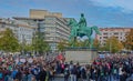 Collection of demonstrators under the equestrian statue of the duke on the castle square