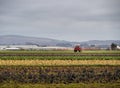 BRAUNTON, ENGLAND - MARCH 16 2021: Modern agriculture in The Great Field, historical site, crop spraying.