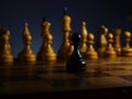 Brave ambitious businessman and challenge. Black wooden pawn and chess