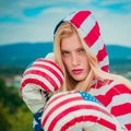 Brave American patriot adult girl in a 4th of July. Close Up boxer woman is getting ready to strike, wearing in red