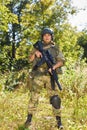 Brave caucasian woman is engaged in hunting weapon gun or rifle Royalty Free Stock Photo