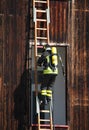 Brave firefighters with oxygen tank fire during an exercise held