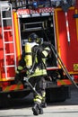 Brave firefighters with oxygen tank fire during an exercise held