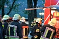 Brave firefighters with the truck and fire hydrants in operation