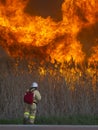 Brave fireman extinguishes a huge fire Royalty Free Stock Photo