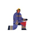 Brave fireman using red buckets extinguishing fire firefighter wearing uniform and helmet firefighting emergency service