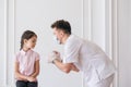 Brave girl receiving injection in arm in a hospital Royalty Free Stock Photo