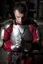 Knight Kneeling On His Knees With Bowed Head And Praying Hands Royalty Free Stock Photo