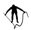 Brave man catching snake with stick vector silhouette illustration isolated on white background.