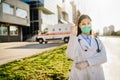 Brave optimistic paramedic in the front lines,working in a isolation hospital facility with infected patients.Covid-19 emergency