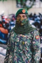 Brave and Strong Woman Soldier in National Maldivian Military Camouflage Uniform on Male Island