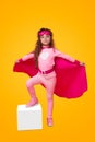 Brave superhero girl in costume in studio Royalty Free Stock Photo
